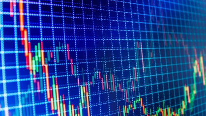 Computer line grid in blue with colorful data points charted.