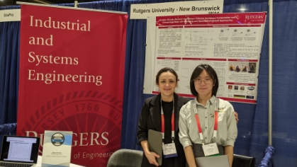 Rutgers ISE team members at a information booth.