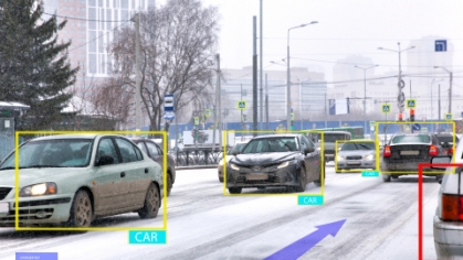 Photo of cars in traffic during snowy weather conditions