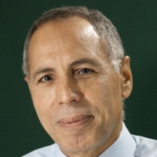 headshot of male with short grey hair