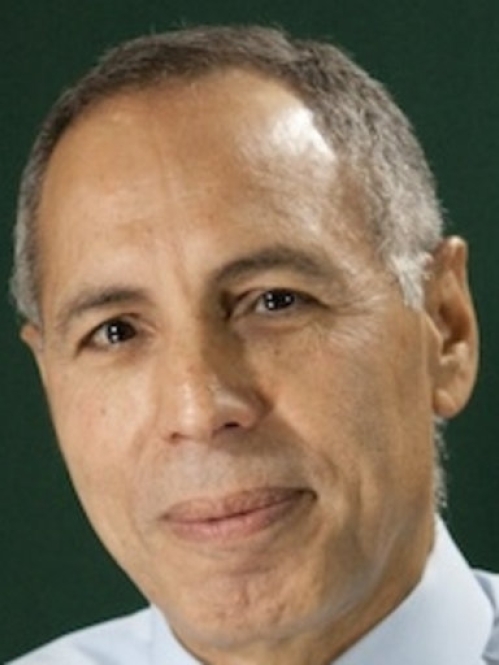 headshot of male with short grey hair