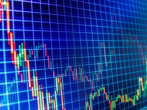 Computer line grid in blue with colorful data points charted.