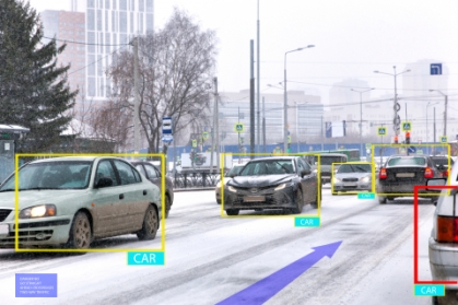 Photo of cars in traffic during snowy weather conditions