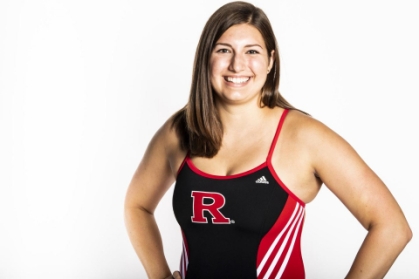 headshot of female swimmer wearing block R black and red swimsuit